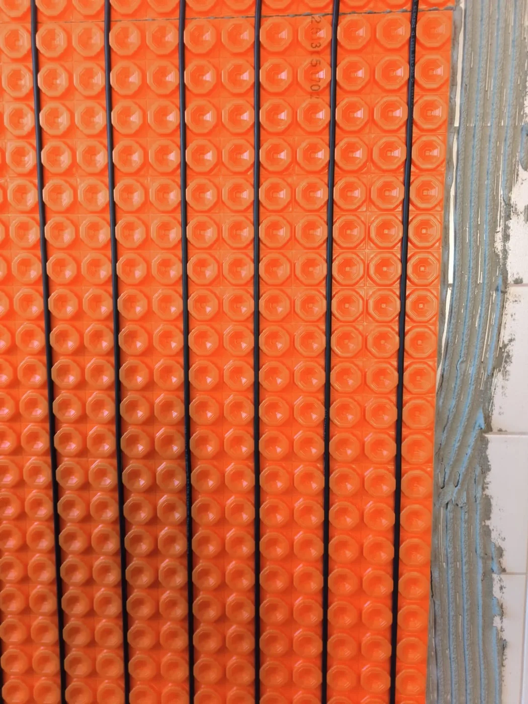 Câble de plancher chauffant électrique en pose en Haute-Savoie