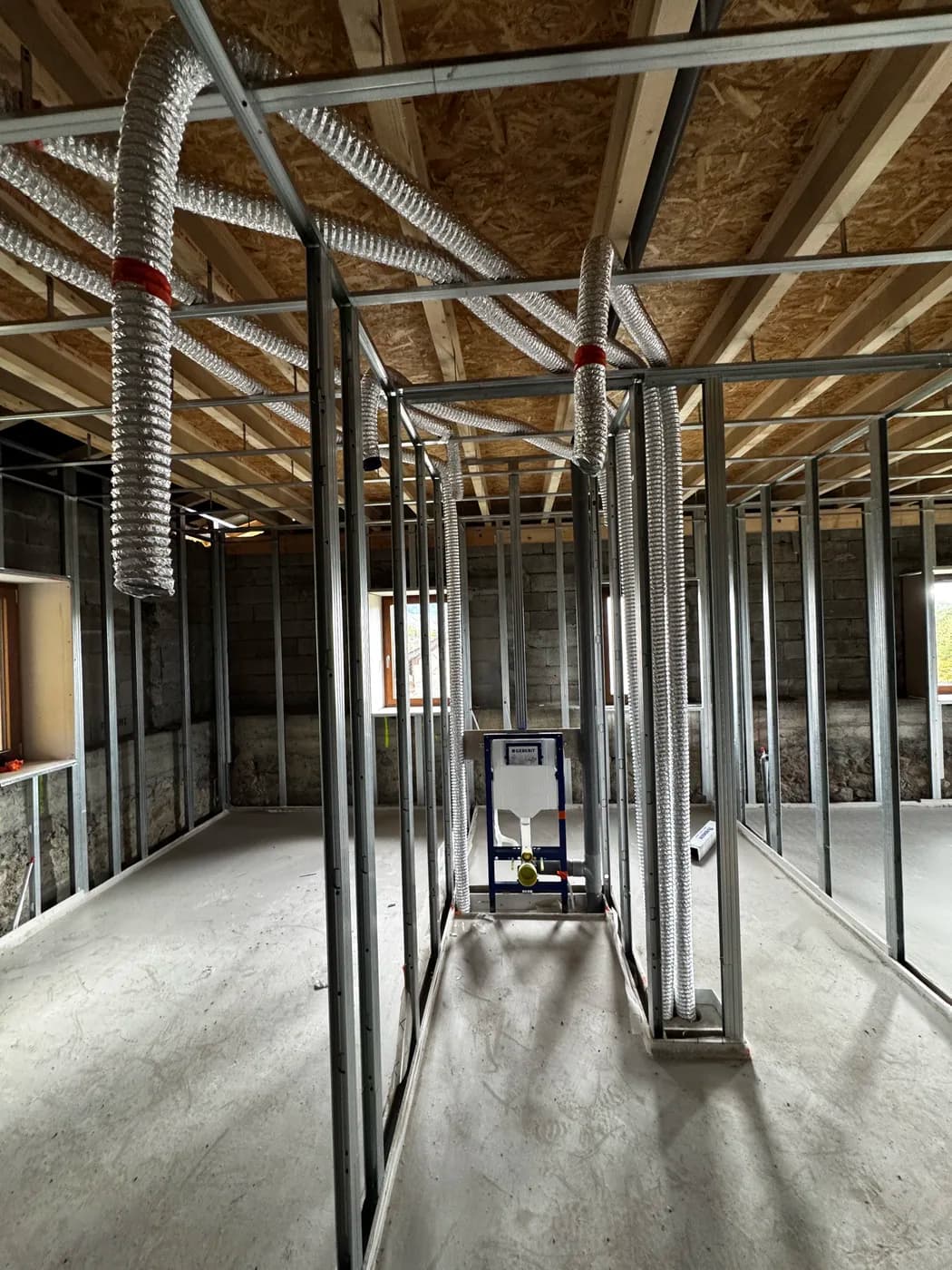 Distribution des gaines VMC sous toiture